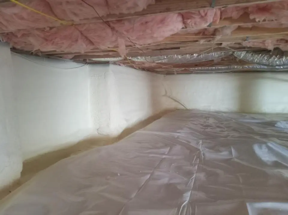 Crawl space encapsulation with closed-cell spray foam for Storm Damage Roof Repair in Poquoson